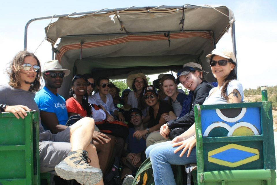 Group traveling in jeep