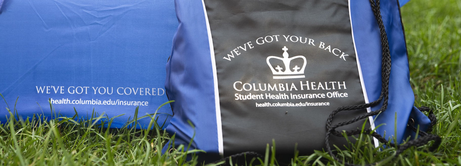 Photo of umbrella with text "We've Got You Covered" and backpack with text "We've Got Your Back"